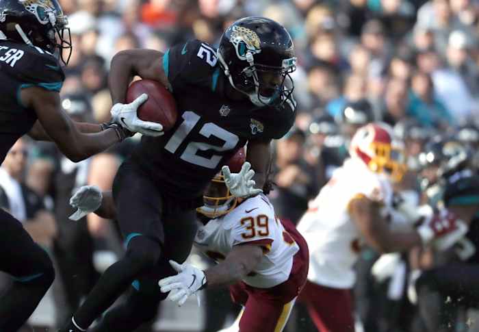 Jacksonville Jaguars receiver Dede Westbrook (12) runs with the ball against the Washington Redskins. Mandatory Credit: Kim Klement-USA TODAY